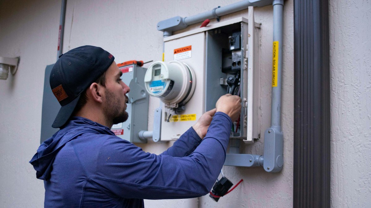HVAC technician working on a unit