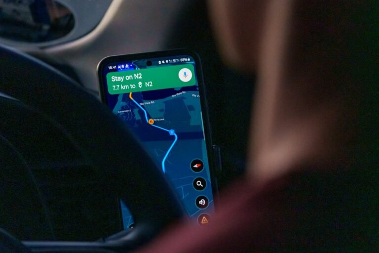 Customer using Google Maps navigation on a smartphone to find a local business